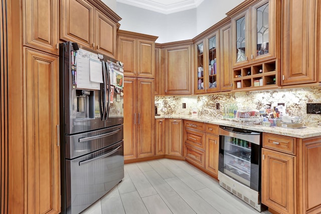 kitchen with stainless steel fridge with ice dispenser, wine cooler, brown cabinets, light stone countertops, and crown molding