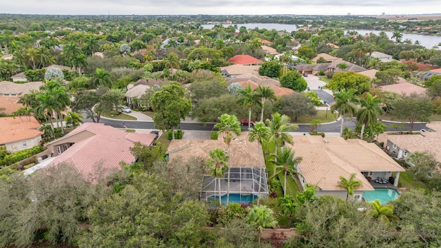 aerial view featuring a residential view and a water view