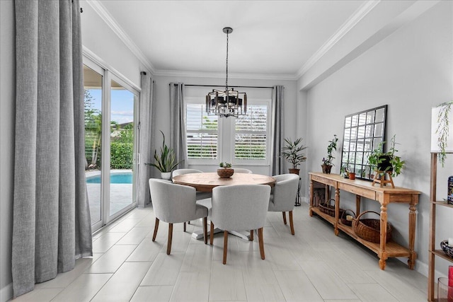 dining area with a notable chandelier and ornamental molding