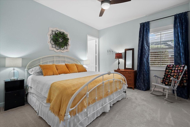 bedroom with ceiling fan and carpet floors