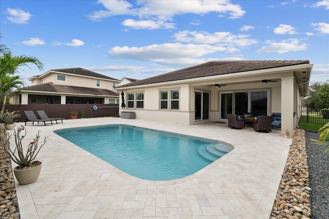 view of pool with ceiling fan, an outdoor hangout area, and a patio