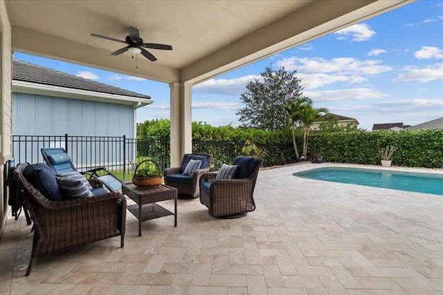 view of patio featuring ceiling fan, a fenced in pool, and an outdoor living space