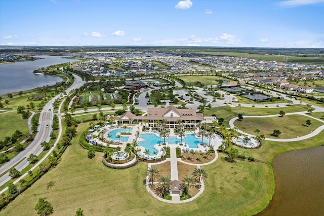 birds eye view of property featuring a water view