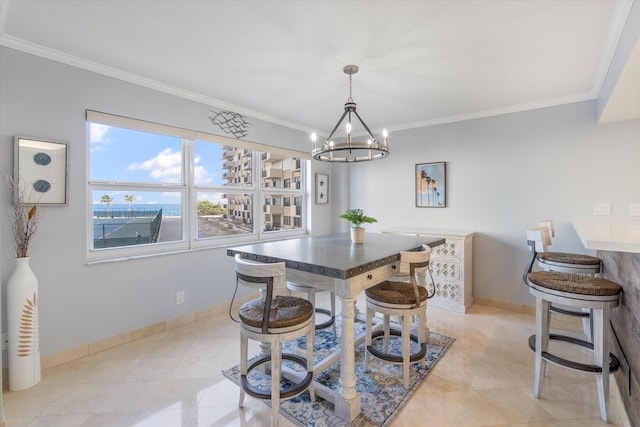 dining area featuring an inviting chandelier and crown molding