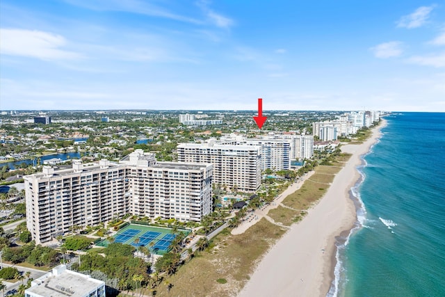 drone / aerial view with a view of the beach and a water view