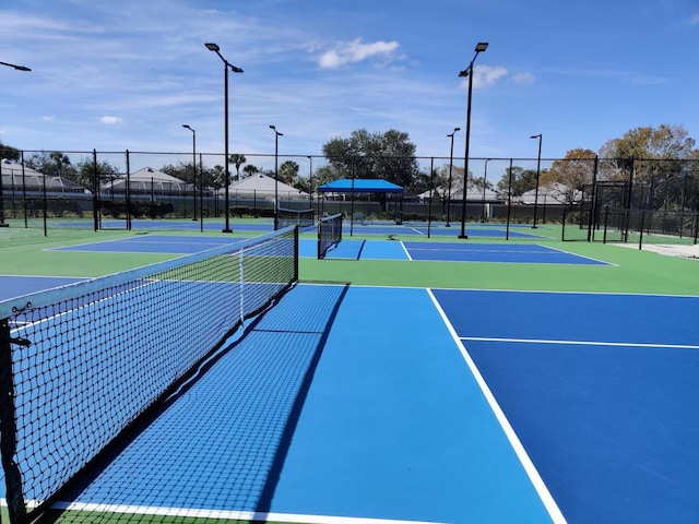 view of tennis court with basketball court