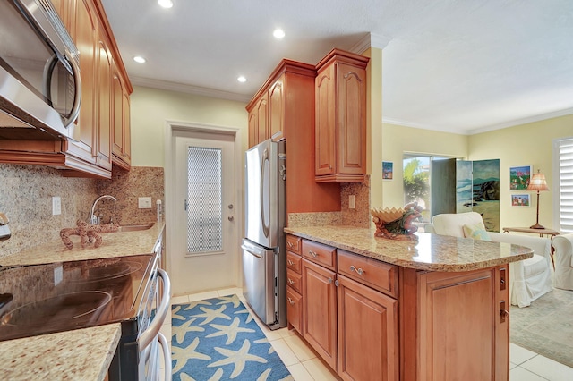 kitchen with light tile patterned floors, appliances with stainless steel finishes, tasteful backsplash, ornamental molding, and light stone counters