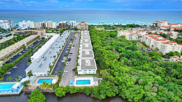 drone / aerial view with a water view