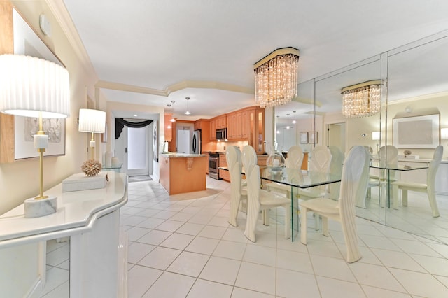 dining space featuring ornamental molding, light tile patterned floors, and a chandelier