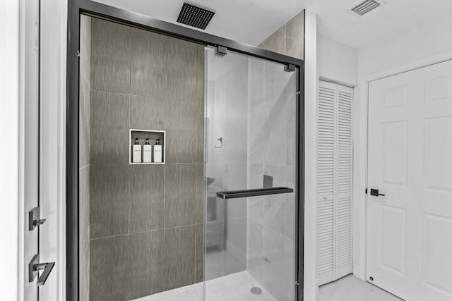 bathroom featuring an enclosed shower