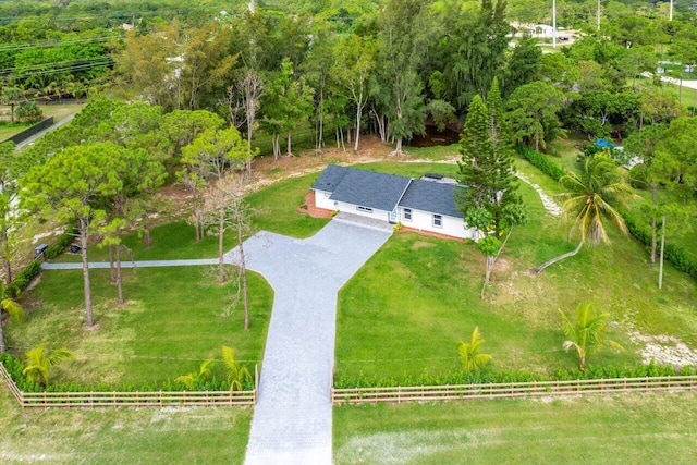 birds eye view of property with a rural view