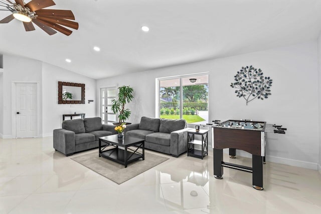 living room with vaulted ceiling, ceiling fan, and light tile patterned flooring