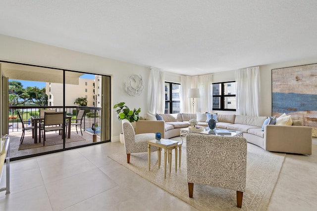 tiled living room with a textured ceiling