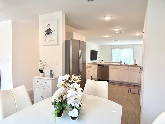 dining space with sink