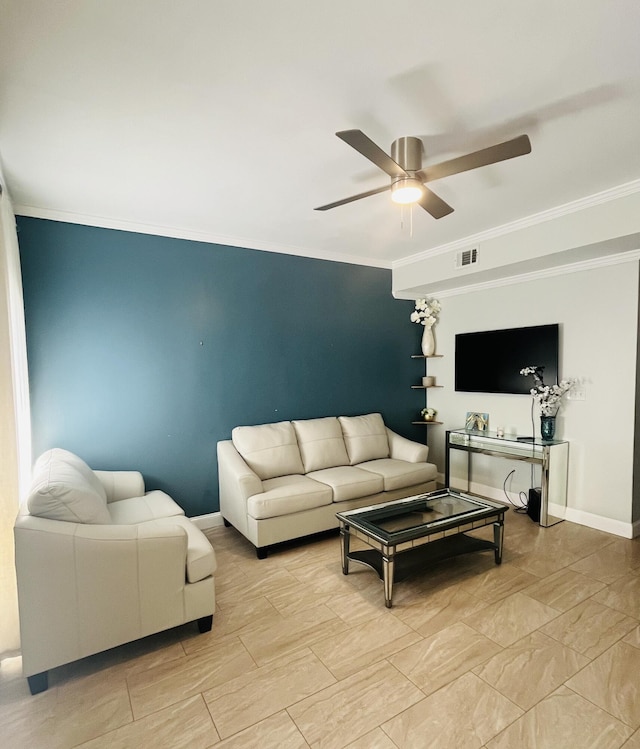 living room with ceiling fan and crown molding