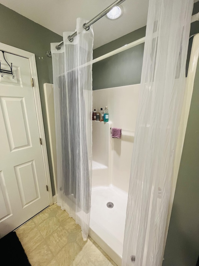 bathroom with walk in shower