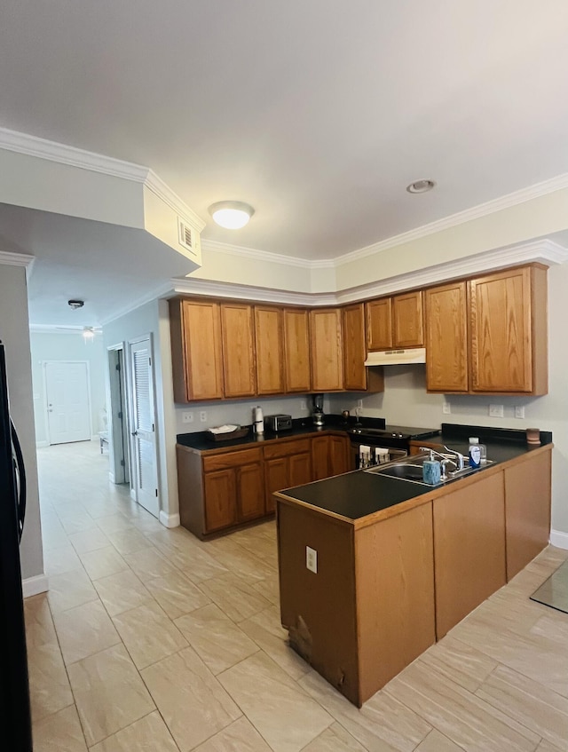 kitchen featuring black fridge, sink, ornamental molding, light tile patterned floors, and kitchen peninsula