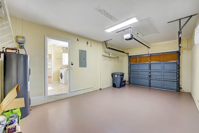 garage featuring water heater, a garage door opener, electric panel, and washer / clothes dryer