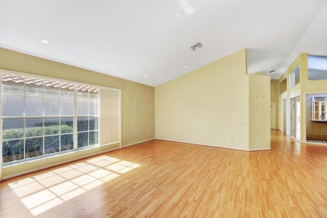 spare room with light wood-type flooring