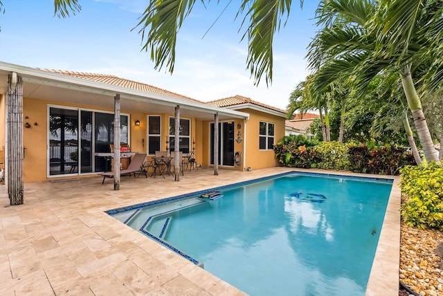 view of pool with a patio area