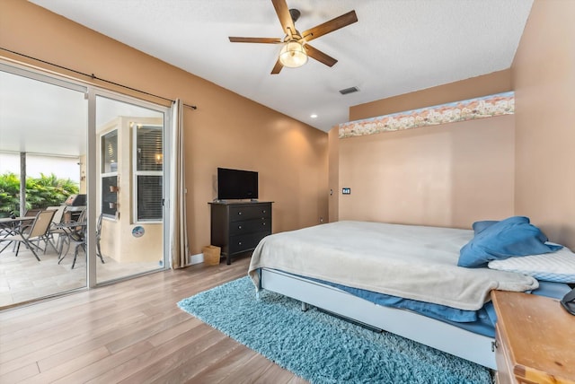 bedroom featuring ceiling fan and wood-type flooring