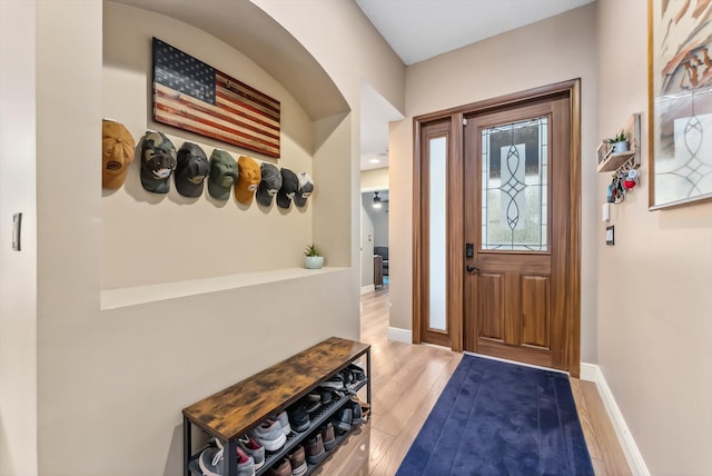 foyer entrance with wood-type flooring