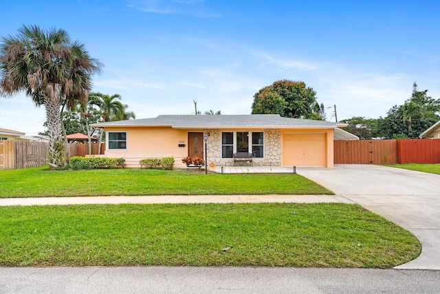 ranch-style house with a front yard and a garage