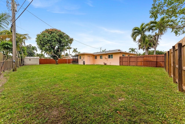 view of yard with a shed