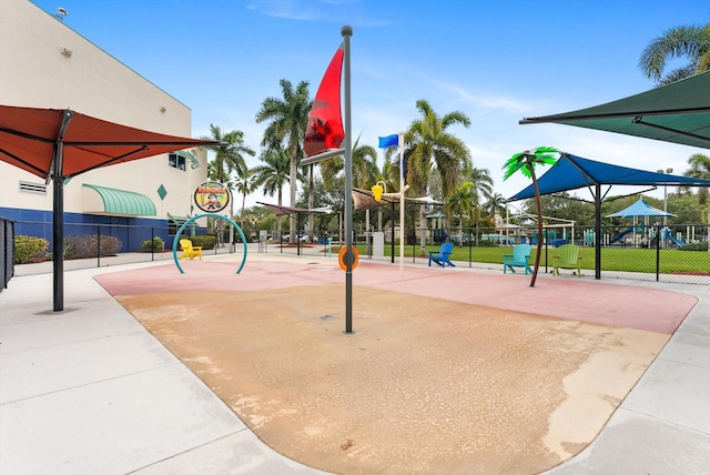 view of property's community with a playground