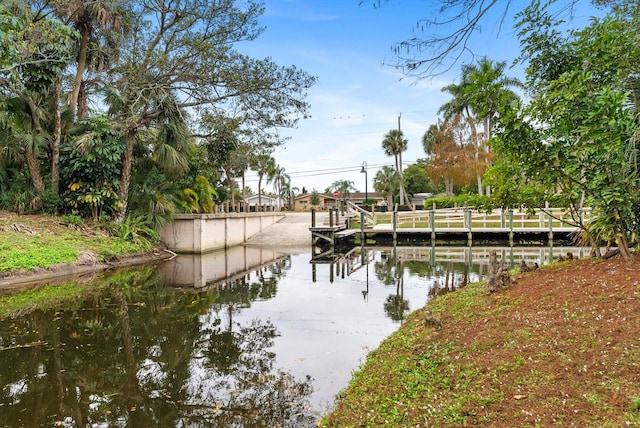 dock area featuring a water view