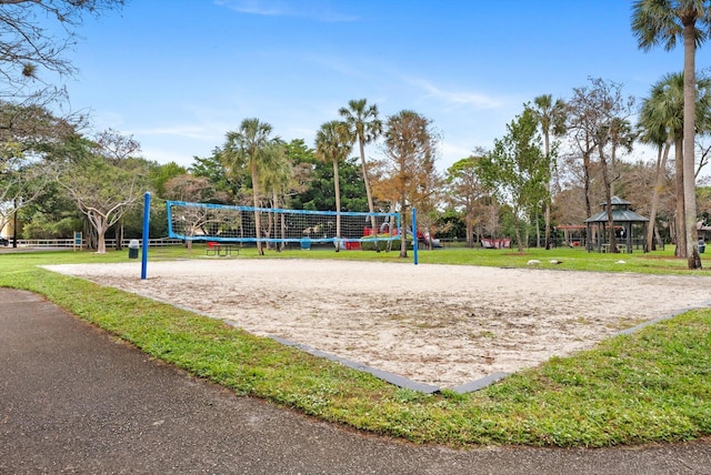 surrounding community featuring volleyball court, a gazebo, and a yard