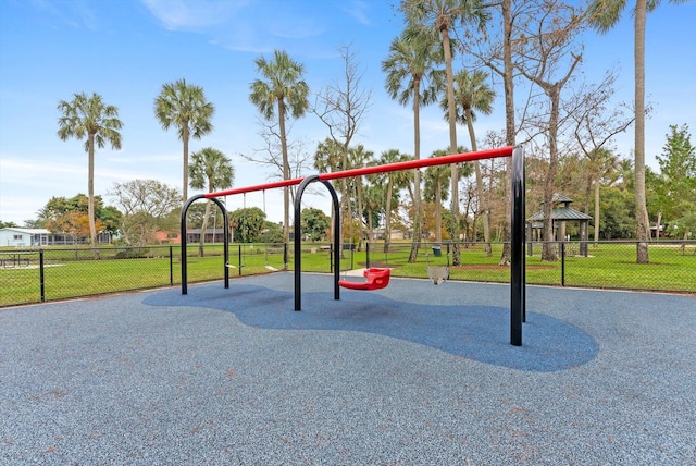 view of playground with a yard