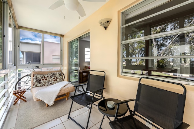 sunroom / solarium with ceiling fan