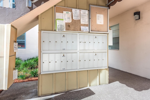 view of property's community with a mail area