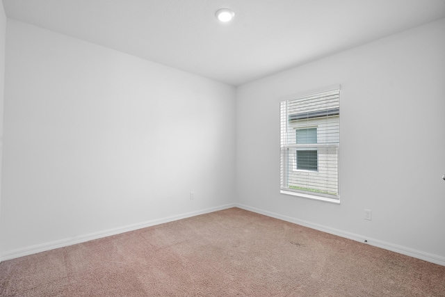 empty room with carpet floors