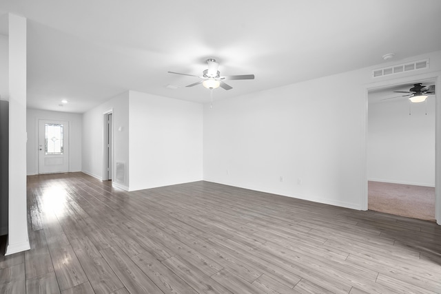 unfurnished living room with ceiling fan and light hardwood / wood-style floors