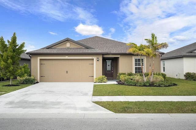 ranch-style home featuring a garage and a front yard