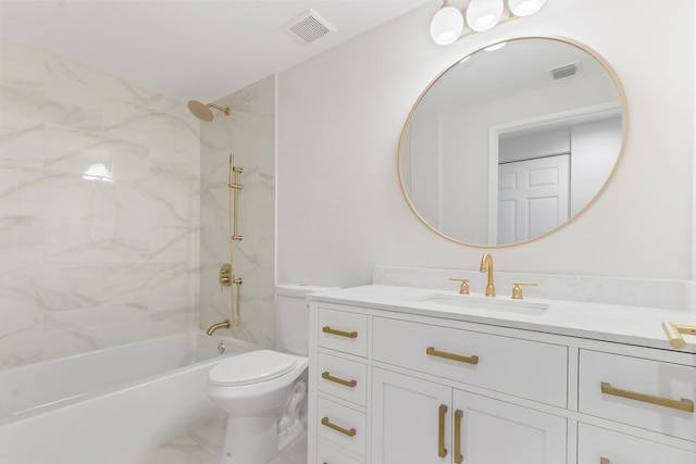 full bathroom featuring vanity, tiled shower / bath combo, and toilet