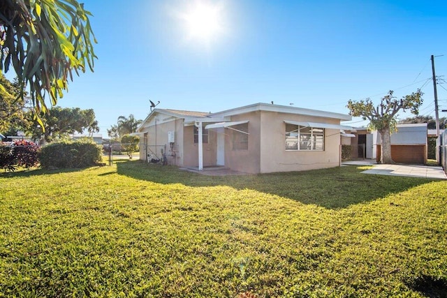 exterior space with a yard