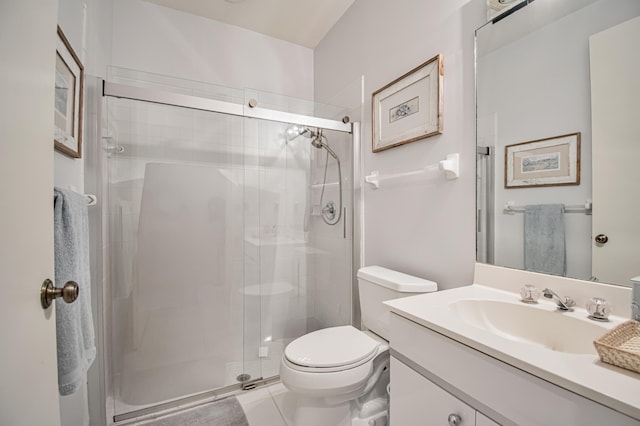 bathroom with toilet, walk in shower, and vanity