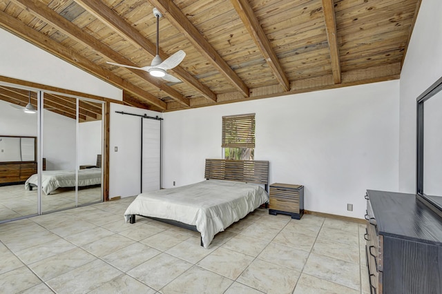 bedroom featuring ceiling fan, wooden ceiling, lofted ceiling with beams, and a barn door