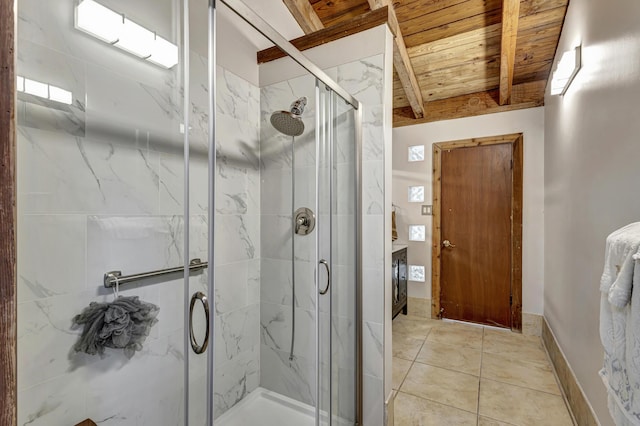 bathroom featuring beam ceiling, tile patterned floors, walk in shower, and wooden ceiling