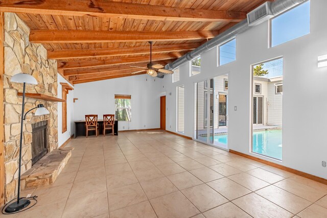 interior space with a high ceiling and light tile patterned floors