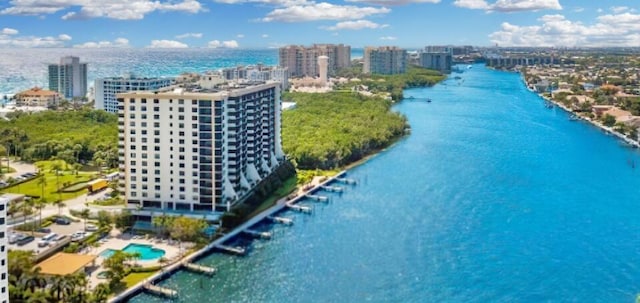 birds eye view of property featuring a water view