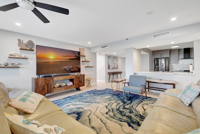 living room with ceiling fan