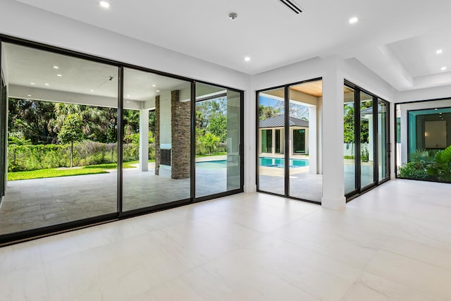 3100 Palm Dr, Delray Beach, FL 33483 - doorway featuring visible vents and recessed lighting