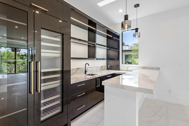 3100 Palm Dr, Delray Beach, FL 33483 - kitchen with a sink, modern cabinets, marble finish floor, open shelves, and light stone countertops