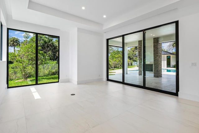 3100 Palm Dr, Delray Beach, FL 33483 - empty room featuring recessed lighting, a wealth of natural light, and baseboards