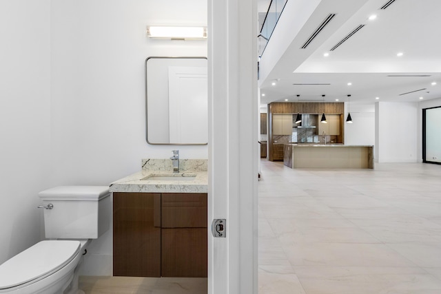 3100 Palm Dr, Delray Beach, FL 33483 - bathroom with recessed lighting, backsplash, visible vents, toilet, and vanity