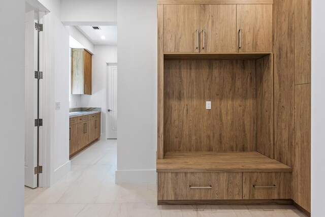 3100 Palm Dr, Delray Beach, FL 33483 - mudroom featuring visible vents and baseboards